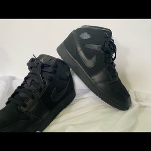 Black Air Jordan 1’s Mid